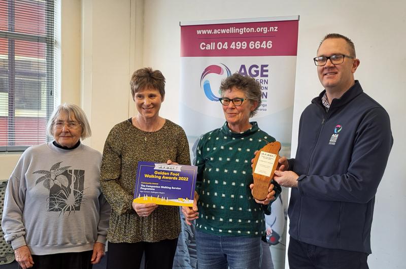 Photo of Dr Judith Davey, Lynne Crossland, Ellen Blake, Stephen Opie holding Award and certificate