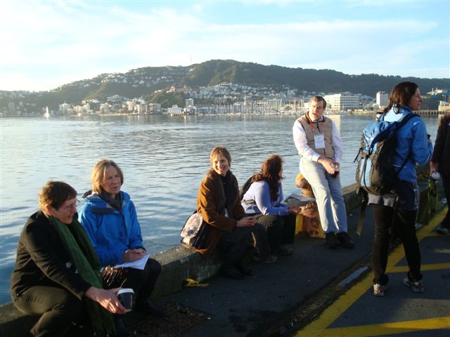 delegates enjoy early morning harbour walk